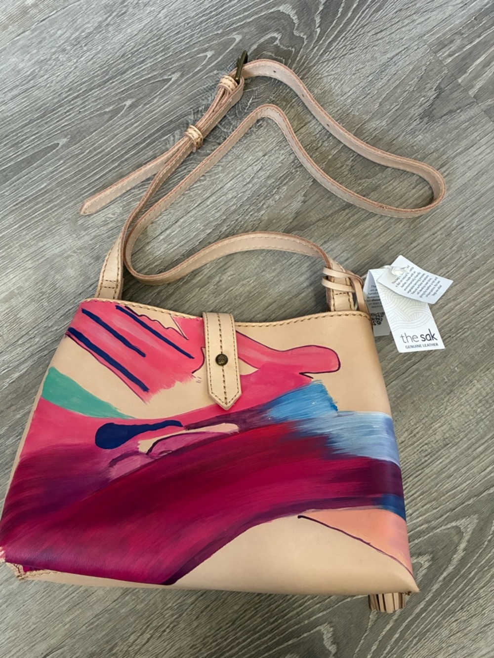 The Sak Hand-Painted Leather Crossbody in Cream with Pink and Blue Accents